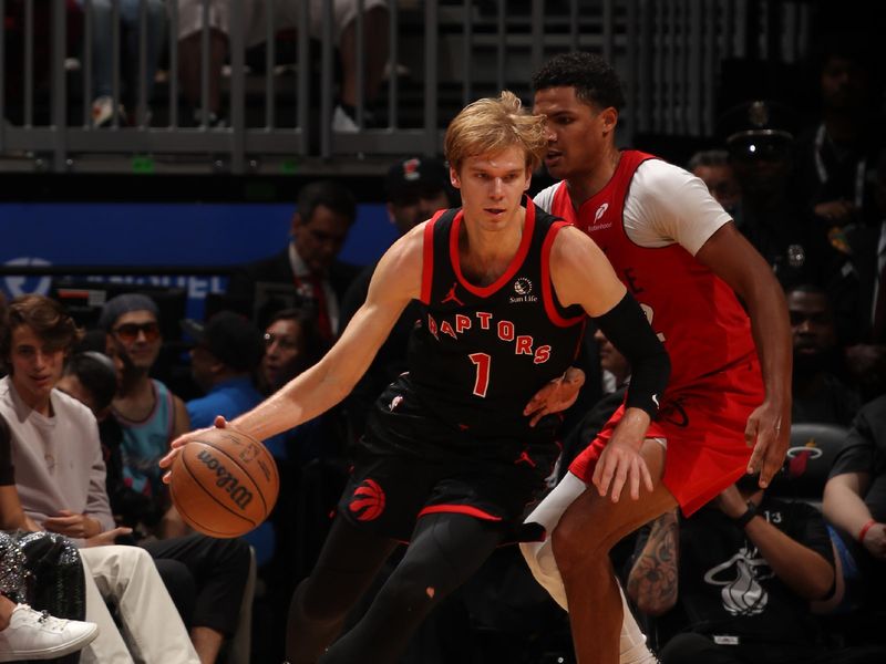 MIAMI, FL - DECEMBER 12:  Gradey Dick #1 of the Toronto Raptors dribbles the ball during the game against the Miami Heat on December 12, 2024 at Kaseya Center in Miami, Florida. NOTE TO USER: User expressly acknowledges and agrees that, by downloading and or using this Photograph, user is consenting to the terms and conditions of the Getty Images License Agreement. Mandatory Copyright Notice: Copyright 2024 NBAE (Photo by Issac Baldizon/NBAE via Getty Images)