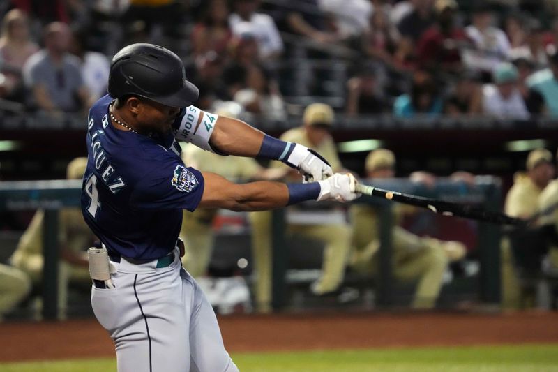 Jul 28, 2023; Phoenix, Arizona, USA; Seattle Mariners center fielder Julio Rodriguez (44) hits a broken bat single against the Arizona Diamondbacks during the first inning at Chase Field. Mandatory Credit: Joe Camporeale-USA TODAY Sports