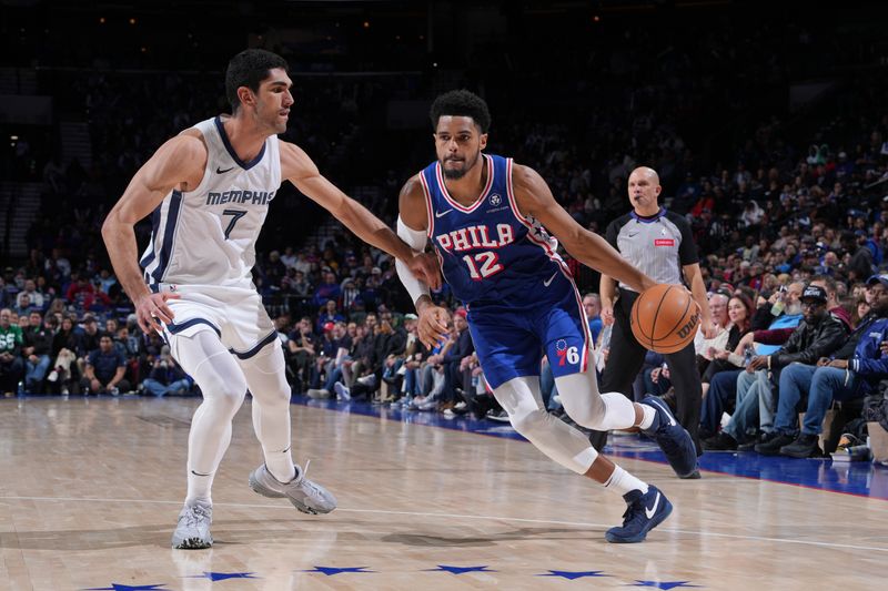 PHILADELPHIA, PA - MARCH 6: Tobias Harris #12 of the Philadelphia 76ers handles the ball during the game against the Memphis Grizzlies on March 6, 2024 at the Wells Fargo Center in Philadelphia, Pennsylvania NOTE TO USER: User expressly acknowledges and agrees that, by downloading and/or using this Photograph, user is consenting to the terms and conditions of the Getty Images License Agreement. Mandatory Copyright Notice: Copyright 2024 NBAE (Photo by Jesse D. Garrabrant/NBAE via Getty Images)