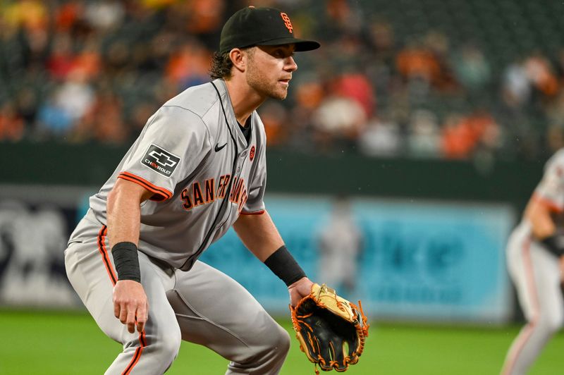 Sep 17, 2024; Baltimore, Maryland, USA; San Francisco Giants third baseman Brett Wisely (0) looks into home plate during the first inning against the Baltimore Orioles  at Oriole Park at Camden Yards. Mandatory Credit: Tommy Gilligan-Imagn Images