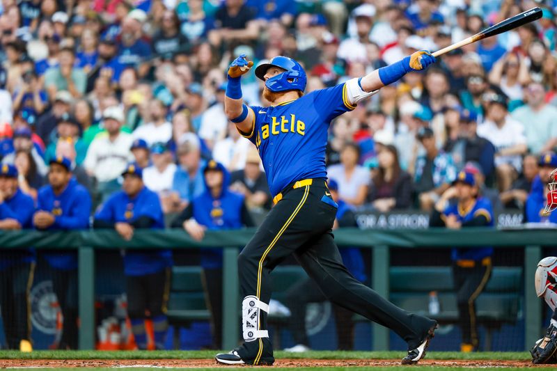 Aug 2, 2024; Seattle, Washington, USA; Seattle Mariners first baseman Luke Raley (20) hits a grand-slam home run against the Philadelphia Phillies during the second inning at T-Mobile Park. Mandatory Credit: Joe Nicholson-USA TODAY Sports