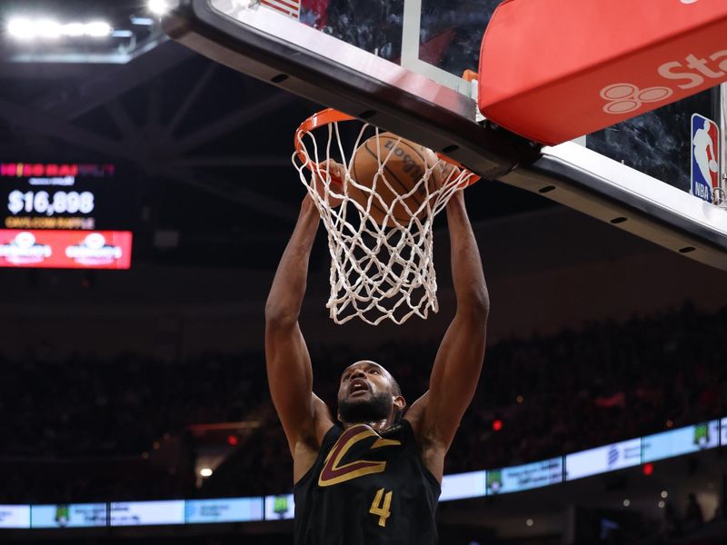 CLEVELAND, OH - MARCH 5: Evan Mobley #4 of the Cleveland Cavaliers dunks the ball during the game against the Boston Celtics on March 5, 2024 at Rocket Mortgage FieldHouse in Cleveland, Ohio. NOTE TO USER: User expressly acknowledges and agrees that, by downloading and/or using this Photograph, user is consenting to the terms and conditions of the Getty Images License Agreement. Mandatory Copyright Notice: Copyright 2024 NBAE (Photo by Lauren Leigh Bacho/NBAE via Getty Images)