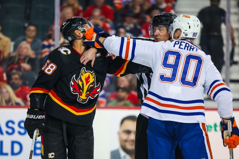 Apr 6, 2024; Calgary, Alberta, CAN; Calgary Flames defenseman Oliver Kylington (58) gets into a scrum with Edmonton Oilers right wing Corey Perry (90) during the first period at Scotiabank Saddledome. Mandatory Credit: Sergei Belski-USA TODAY Sports