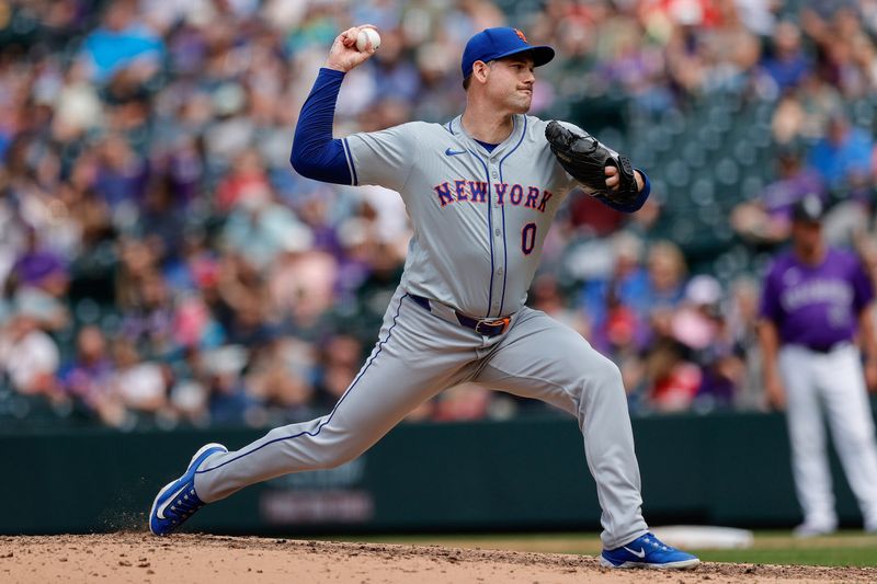 Aug 8, 2024; Denver, Colorado, USA; New York Mets relief pitcher Adam Ottavino (0) pitches in the sixth inning against the Colorado Rockies at Coors Field. Mandatory Credit: Isaiah J. Downing-USA TODAY Sports
