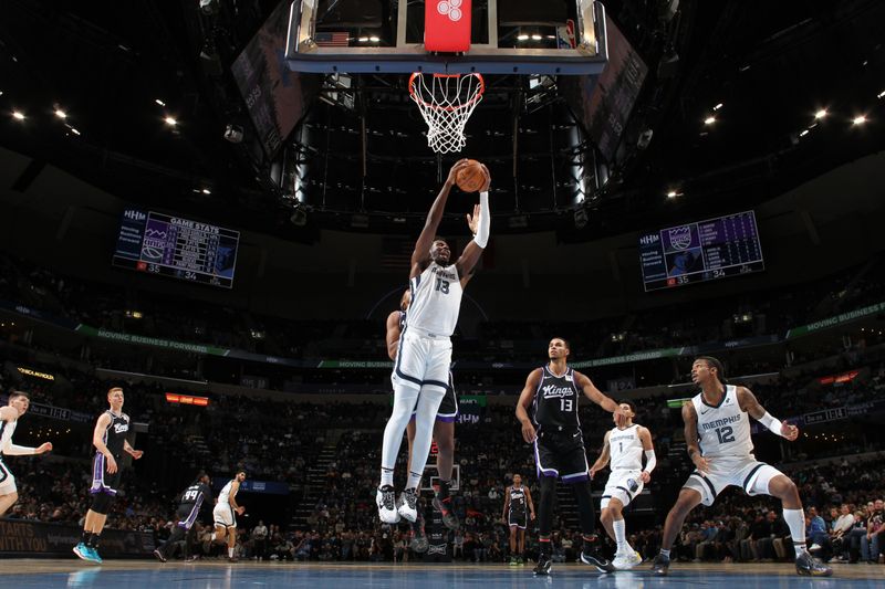 MEMPHIS, TN - DECEMBER 5: Jaren Jackson Jr. #13 of the Memphis Grizzlies rebounds the ball during the game against the Sacramento Kings on December 5, 2024 at FedExForum in Memphis, Tennessee. NOTE TO USER: User expressly acknowledges and agrees that, by downloading and or using this photograph, User is consenting to the terms and conditions of the Getty Images License Agreement. Mandatory Copyright Notice: Copyright 2024 NBAE (Photo by Joe Murphy/NBAE via Getty Images)