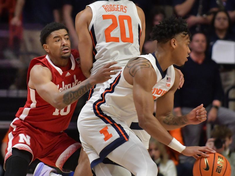 Jan 31, 2023; Champaign, Illinois, USA; Illinois Fighting Illini guard Ty Rodgers (20) sets a screen on Nebraska Cornhuskers guard Jamarques Lawrence (10) as teammate Terrence Shannon Jr. (0) dribbles the ball during the second half at State Farm Center. Mandatory Credit: Ron Johnson-USA TODAY Sports