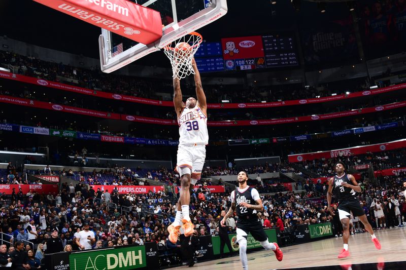 LOS ANGELES, CA - APRIL 10: Saben Lee #38 of the Phoenix Suns dunks the ball during the game against the LA Clippers on April 10, 2024 at Crypto.Com Arena in Los Angeles, California. NOTE TO USER: User expressly acknowledges and agrees that, by downloading and/or using this Photograph, user is consenting to the terms and conditions of the Getty Images License Agreement. Mandatory Copyright Notice: Copyright 2024 NBAE (Photo by Adam Pantozzi/NBAE via Getty Images)