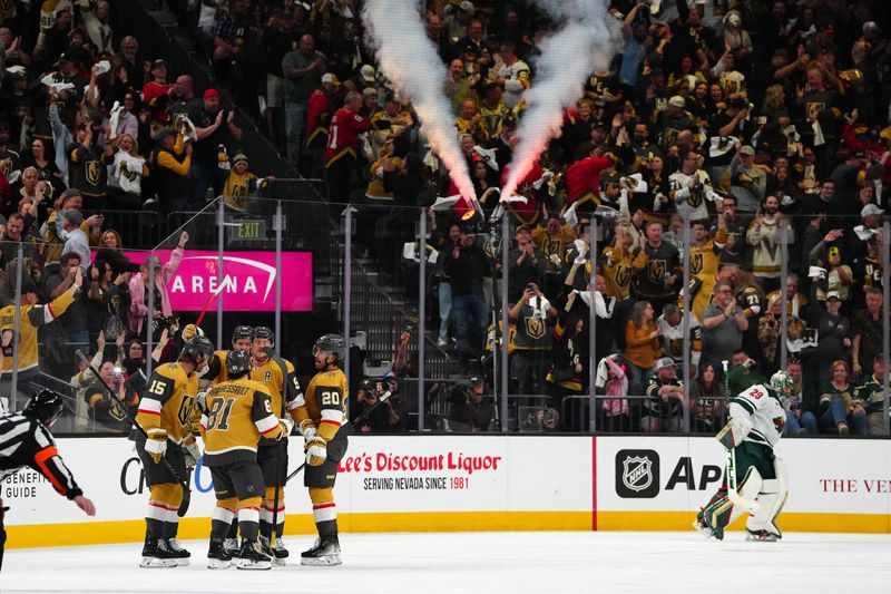 Apr 12, 2024; Las Vegas, Nevada, USA; Vegas Golden Knights center Jack Eichel (9) celebrates with team mates after scoring a goal against the Minnesota Wild during the first period at T-Mobile Arena. Mandatory Credit: Stephen R. Sylvanie-USA TODAY Sports