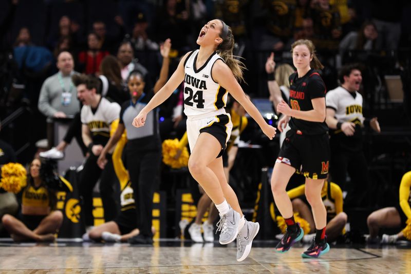 Mar 4, 2023; Minneapolis, MINN, USA; Iowa Hawkeyes guard Gabbie Marshall (24) reacts to her shot against the Maryland Terrapins during the second half at Target Center. Mandatory Credit: Matt Krohn-USA TODAY Sports