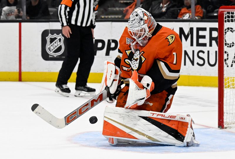 Dec 1, 2024; Anaheim, California, USA; Anaheim Ducks goaltender Lukas Dostal (1) stops a shot against the Ottawa Senators during the shootout at Honda Center. Mandatory Credit: Alex Gallardo-Imagn Images