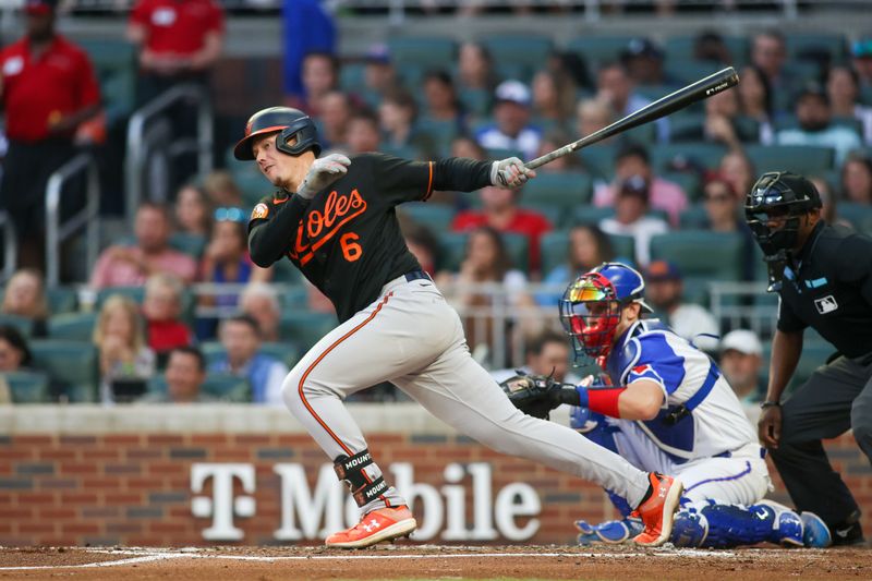 May 6, 2023; Atlanta, Georgia, USA; Baltimore Orioles first baseman Ryan Mountcastle (6) hits a single against the Atlanta Braves in the fourth inning at Truist Park. Mandatory Credit: Brett Davis-USA TODAY Sports
