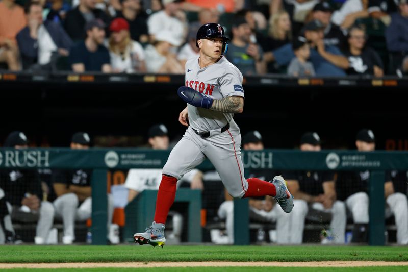 Jun 6, 2024; Chicago, Illinois, USA; Boston Red Sox outfielder Tyler O'Neill (17) runs to score against the Chicago White Sox during the sixth inning at Guaranteed Rate Field. Mandatory Credit: Kamil Krzaczynski-USA TODAY Sports