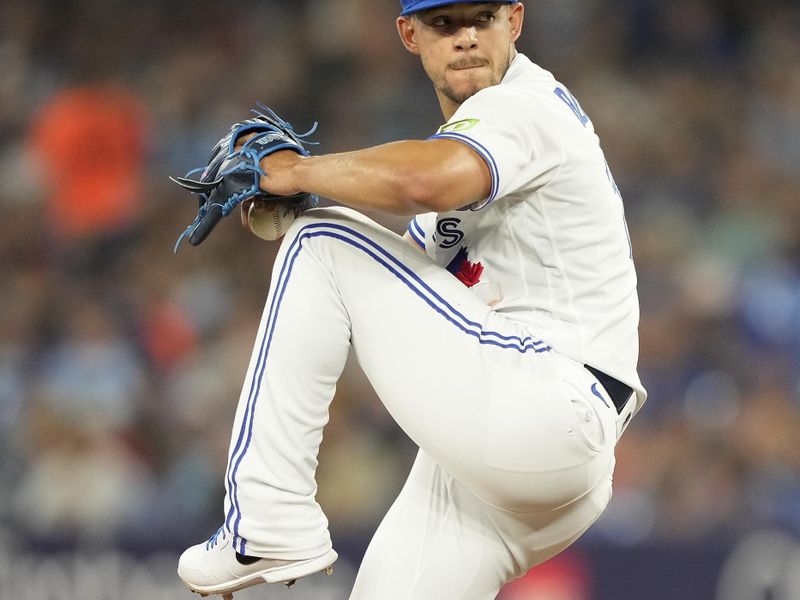 Jul 19, 2023; Toronto, Ontario, CAN; Toronto Blue Jays starting pitcher Jose Berrios (17) pitches to the San Diego Padres during the first inning at Rogers Centre. Mandatory Credit: John E. Sokolowski-USA TODAY Sports