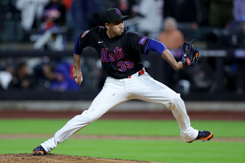 May 23, 2025; New York City, New York, USA; New York Mets relief pitcher Edwin Diaz (39) pitches against the Los Angeles Dodgers during the tenth inning at Citi Field. Mandatory Credit: Brad Penner-Imagn Images