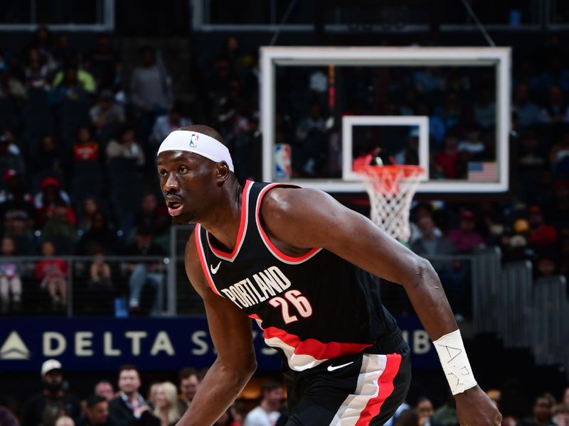 ATLANTA, GA - MARCH 27: Duop Reath #26 of the Portland Trail Blazers dribbles the ball during the game against the Atlanta Hawks on March 27, 2024 at State Farm Arena in Atlanta, Georgia.  NOTE TO USER: User expressly acknowledges and agrees that, by downloading and/or using this Photograph, user is consenting to the terms and conditions of the Getty Images License Agreement. Mandatory Copyright Notice: Copyright 2024 NBAE (Photo by Scott Cunningham/NBAE via Getty Images)