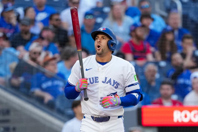 May 15, 2025; Toronto, Ontario, CAN; Toronto Blue Jays outfielder George Springer (4) reacts while at bat during the eighth inning against the Tampa Bay Rays at Rogers Centre. Mandatory Credit: Kevin Sousa-Imagn Images