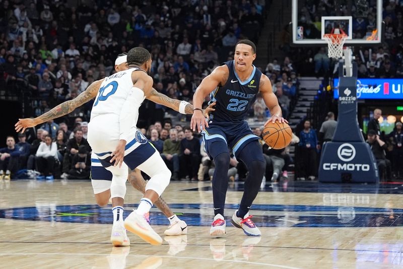 MINNEAPOLIS, MN -  JANUARY 11: Desmond Bane #22 of the Memphis Grizzlies looks to pass the ball during the game against the Minnesota Timberwolves on January 11, 2025 at Target Center in Minneapolis, Minnesota. NOTE TO USER: User expressly acknowledges and agrees that, by downloading and or using this Photograph, user is consenting to the terms and conditions of the Getty Images License Agreement. Mandatory Copyright Notice: Copyright 2025 NBAE (Photo by Jordan Johnson/NBAE via Getty Images)