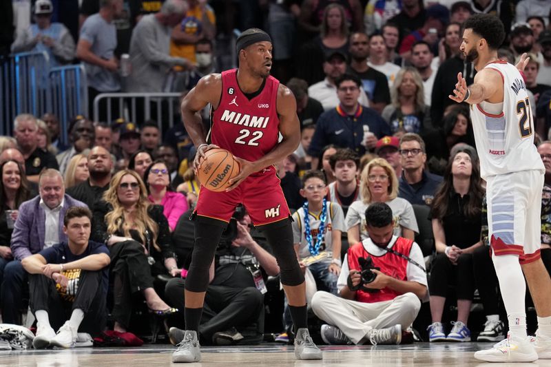 DENVER, CO - JUNE 12: Jimmy Butler #22 of the Miami Heat handles the ball during Game Five of the 2023 NBA Finals on June 12, 2023 at Ball Arena in Denver, Colorado. NOTE TO USER: User expressly acknowledges and agrees that, by downloading and or using this Photograph, user is consenting to the terms and conditions of the Getty Images License Agreement. Mandatory Copyright Notice: Copyright 2023 NBAE (Photo by Jesse D. Garrabrant/NBAE via Getty Images)