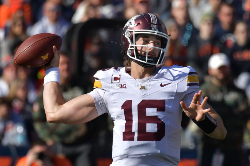 Nov 2, 2024; Champaign, Illinois, USA;  Minnesota Golden Gophers quarterback Max Brosmer (16) passes the ball during the first half at Memorial Stadium. Mandatory Credit: Ron Johnson-Imagn Images