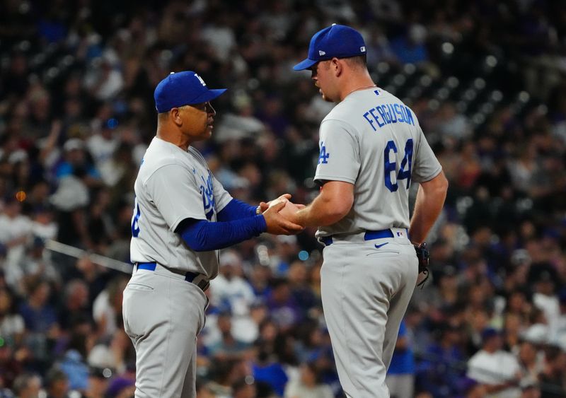 Jul 30, 2022; Denver, Colorado, USA; Los Angeles Dodgers manager Dave Roberts (30) pulls relief pitcher Caleb Ferguson (64) in the seventh inning against the Colorado Rockies at Coors Field. Mandatory Credit: Ron Chenoy-USA TODAY Sports