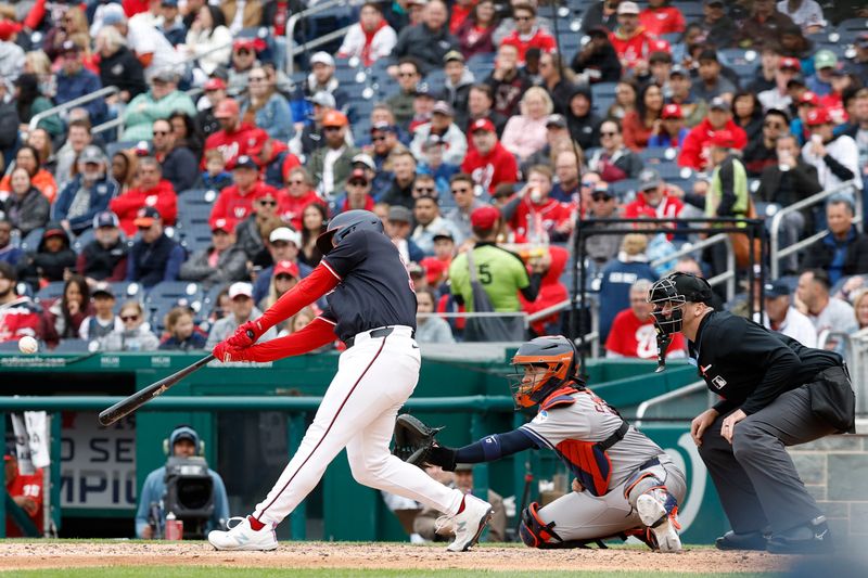 Apr 21, 2024; Washington, District of Columbia, USA; Washington Nationals third base Nick Senzel (13) hits a home run against the Houston Astros during the sixth inning at Nationals Park. Mandatory Credit: Geoff Burke-USA TODAY Sports