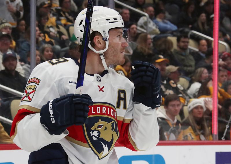 Dec 3, 2024; Pittsburgh, Pennsylvania, USA;  Florida Panthers left wing Matthew Tkachuk (19) reacts after scoring his second goal of the game against the Pittsburgh Penguins during the third period at PPG Paints Arena. Mandatory Credit: Charles LeClaire-Imagn Images