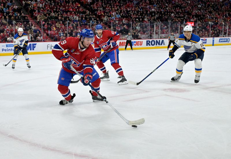 Feb 11, 2024; Montreal, Quebec, CAN; Montreal Canadiens forward Joshua Roy (89) plays the puck during the second period of the game against the St.Louis Blues at the Bell Centre. Mandatory Credit: Eric Bolte-USA TODAY Sports