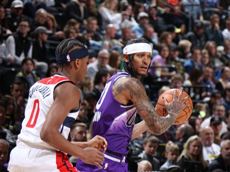 SALT LAKE CITY, UT - MARCH 4:  Jordan Clarkson #00 of the Utah Jazz handles the ball during the game against the Washington Wizards on March 4, 2024 at vivint.SmartHome Arena in Salt Lake City, Utah. NOTE TO USER: User expressly acknowledges and agrees that, by downloading and or using this Photograph, User is consenting to the terms and conditions of the Getty Images License Agreement. Mandatory Copyright Notice: Copyright 2024 NBAE (Photo by Melissa Majchrzak/NBAE via Getty Images)