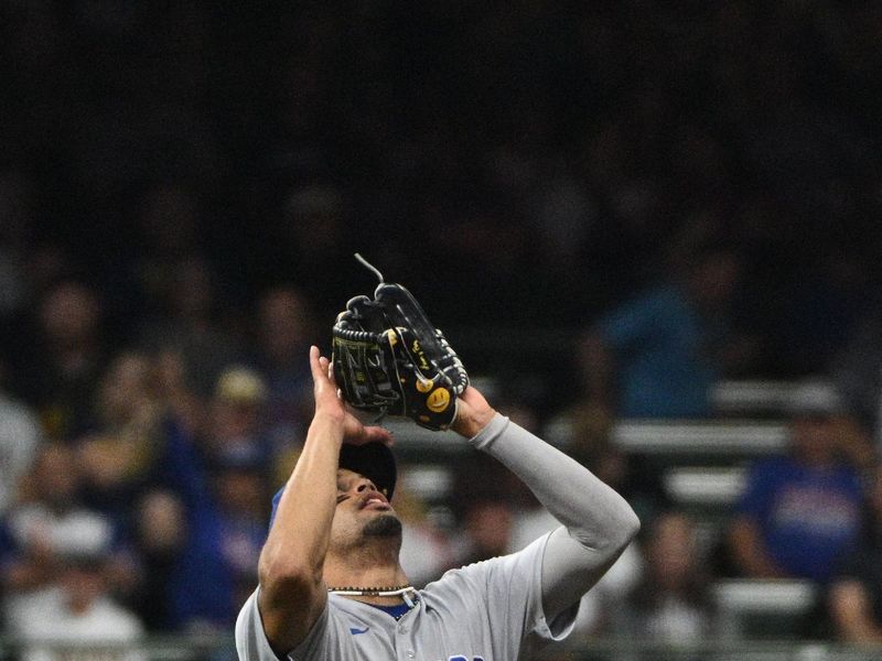 Sep 30, 2023; Milwaukee, Wisconsin, USA; Chicago Cubs second baseman Christopher Morel (5) catches and fly ball for an out against the Milwaukee Brewers in the seventh inning at American Family Field. Mandatory Credit: Michael McLoone-USA TODAY Sports