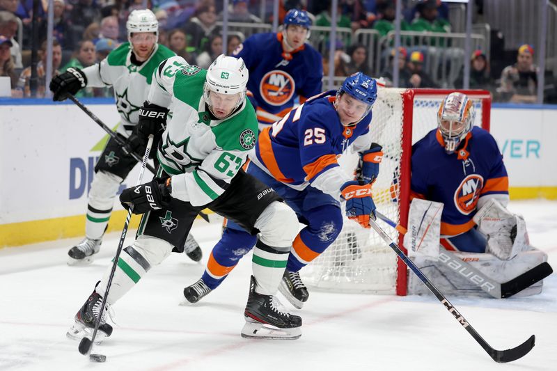 Jan 21, 2024; Elmont, New York, USA; Dallas Stars right wing Evgenii Dadonov (63) skates with the puck against New York Islanders defenseman Sebastian Aho (25) and goaltender Ilya Sorokin (30) during the third period at UBS Arena. Mandatory Credit: Brad Penner-USA TODAY Sports