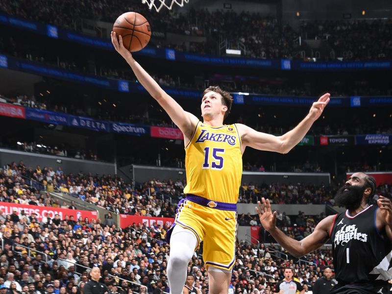 LOS ANGELES, CA - FEBRUARY 28: Austin Reaves #15 of the Los Angeles Lakers drives to the basket during the game against the LA Clippers on February 28, 2024 at Crypto.Com Arena in Los Angeles, California. NOTE TO USER: User expressly acknowledges and agrees that, by downloading and/or using this Photograph, user is consenting to the terms and conditions of the Getty Images License Agreement. Mandatory Copyright Notice: Copyright 2024 NBAE (Photo by Andrew D. Bernstein/NBAE via Getty Images)