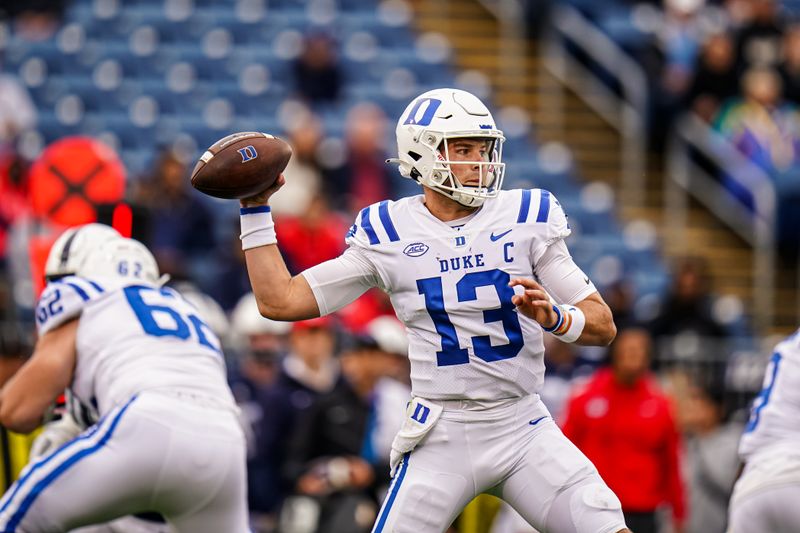 Sep 23, 2023; East Hartford, Connecticut, USA; Duke Blue Devils quarterback Riley Leonard (13) throws a pass against the UConn Huskies at Rentschler Field at Pratt & Whitney Stadium. Mandatory Credit: David Butler II-USA TODAY Sports