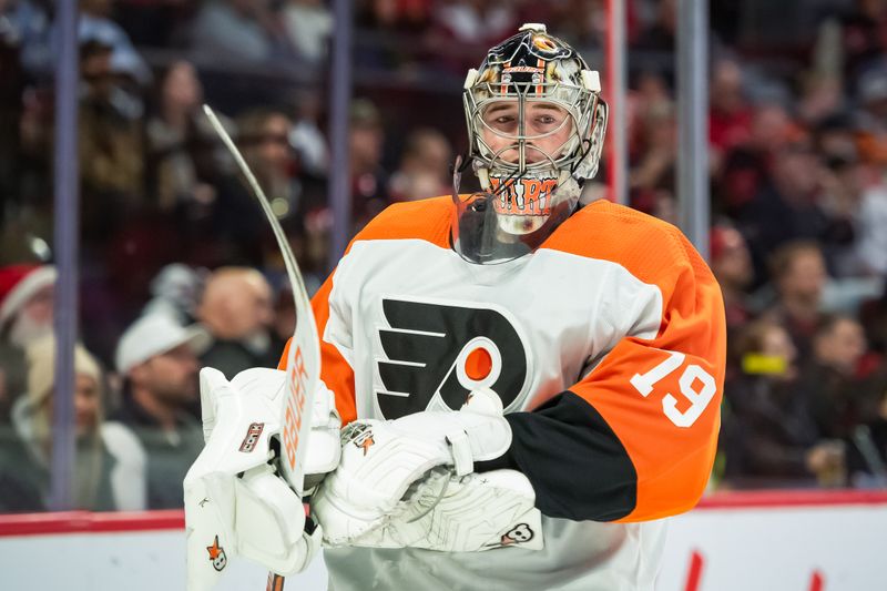 Oct 14, 2023; Ottawa, Ontario, CAN; Philadelphia Flyers goalie Carter Hart (79) skates on the ice in the first period against the Ottawa Senators at the Canadian Tire Centre. Mandatory Credit: Marc DesRosiers-USA TODAY Sports