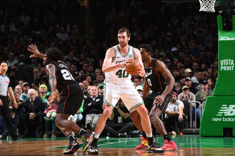 BOSTON, MA - MARCH 18:  Luke Kornet #40 of the Boston Celtics handles the ball during the game against the Detroit Pistons on March 18, 2024 at the TD Garden in Boston, Massachusetts. NOTE TO USER: User expressly acknowledges and agrees that, by downloading and or using this photograph, User is consenting to the terms and conditions of the Getty Images License Agreement. Mandatory Copyright Notice: Copyright 2024 NBAE  (Photo by Brian Babineau/NBAE via Getty Images)