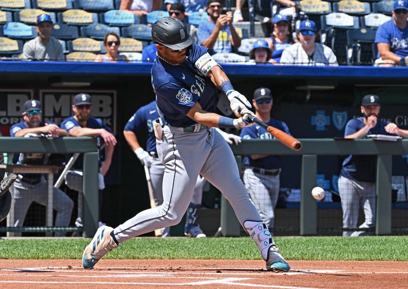 Aug 17, 2023; Kansas City, Missouri, USA;  Seattle Mariners center fielder Julio Rodriguez (44) singles in the first inning against the Kansas City Royals at Kauffman Stadium. Mandatory Credit: Peter Aiken-USA TODAY Sports