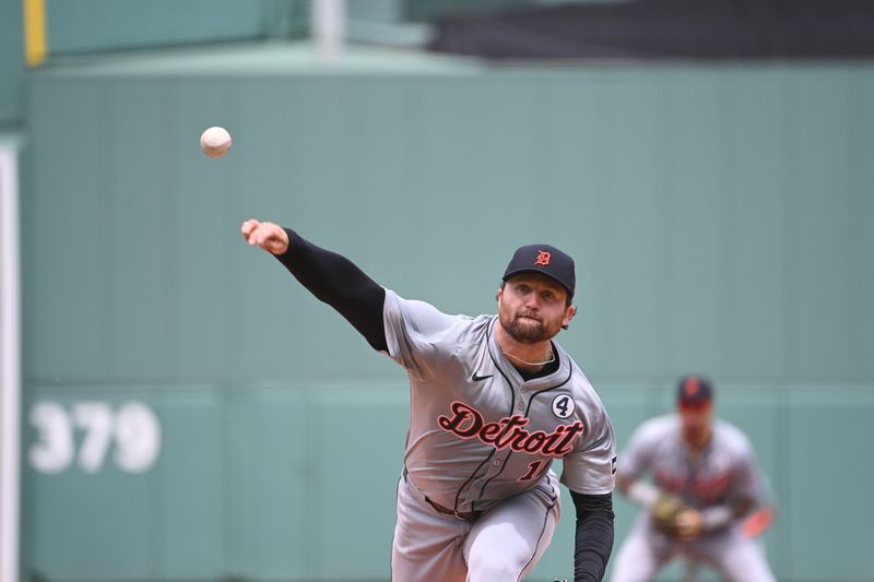 Jun 2, 2024; Boston, Massachusetts, USA;  Detroit Tigers starting pitcher Casey Mize (12) pitches against the Boston Red Sox during the first inning at Fenway Park. Mandatory Credit: Eric Canha-USA TODAY Sports