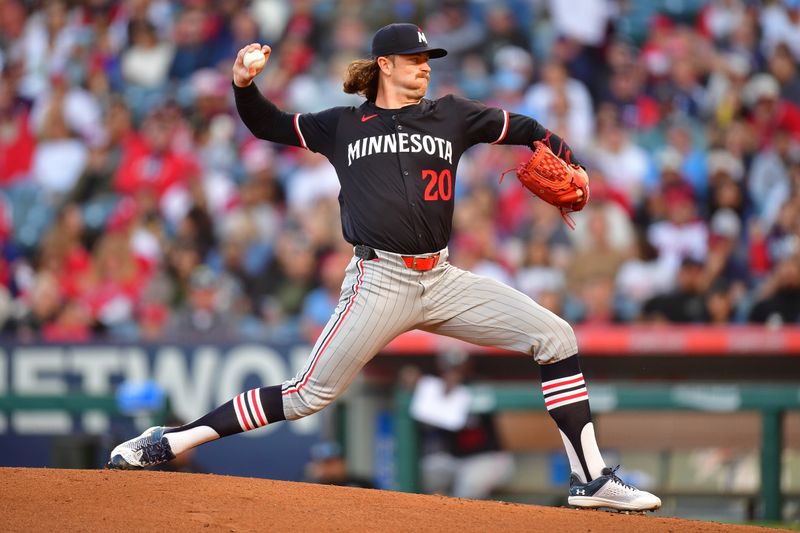 Apr 27, 2024; Anaheim, California, USA; Minnesota Twins pitcher Chris Paddack (20) throws against the Los Angeles Angels during the first inning at Angel Stadium. Mandatory Credit: Gary A. Vasquez-USA TODAY Sports