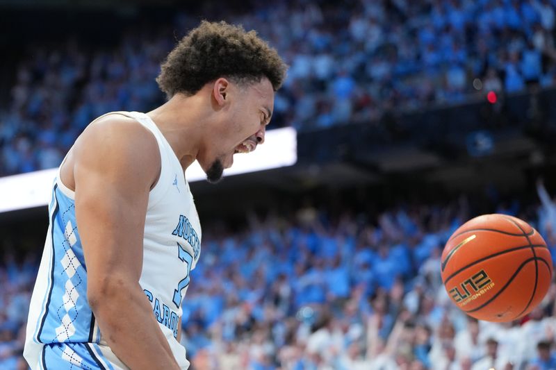 Feb 23, 2026; Chapel Hill, North Carolina, USA; North Carolina Tar Heels guard Seth Trimble (7) reacts after scoring in the second half at Dean E. Smith Center. Mandatory Credit: Bob Donnan-Imagn Images