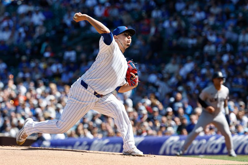 Sep 7, 2024; Chicago, Illinois, USA; Chicago Cubs starting pitcher Javier Assad (72) delivers a pitch against the New York Yankees during the first inning at Wrigley Field. Mandatory Credit: Kamil Krzaczynski-Imagn Images