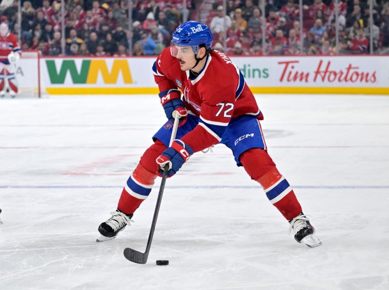 Nov 15, 2025; Montreal, Quebec, CAN; Montreal Canadiens defenseman Arber Xhekaj (72) plays the puck during the second period of the game against the Boston Bruins at the Bell Centre. Mandatory Credit: Eric Bolte-Imagn Images