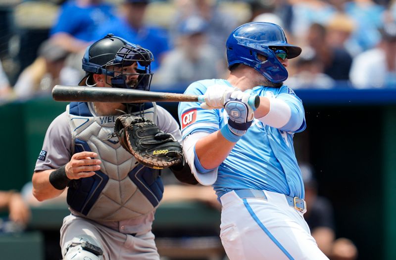 Jun 13, 2024; Kansas City, Missouri, USA; Kansas City Royals first baseman Vinnie Pasquantino (9) hits an RBI double against the New York Yankees during the fourth inning at Kauffman Stadium. Mandatory Credit: Jay Biggerstaff-USA TODAY Sports