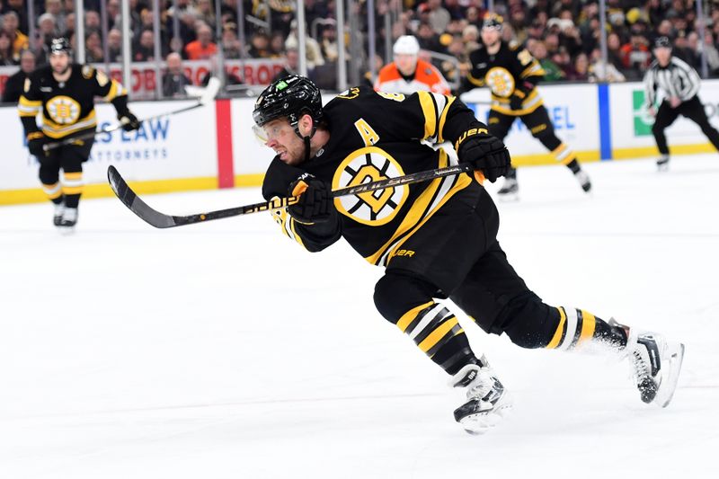 Jan 29, 2026; Boston, Massachusetts, USA; Boston Bruins right wing David Pastrnak (88) shoots the puck during the first period against the Philadelphia Flyers at TD Garden. Mandatory Credit: Bob DeChiara-Imagn Images