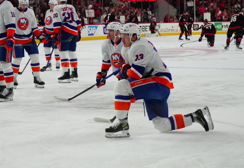 Apr 20, 2024; Raleigh, North Carolina, USA; New York Islanders center Mathew Barzal (13) looks on before the game during the warmups against the Carolina Hurricanes in game one of the first round of the 2024 Stanley Cup Playoffs at PNC Arena. Mandatory Credit: James Guillory-USA TODAY Sports