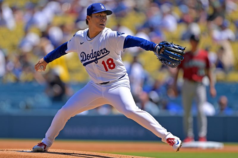 Aug 31, 2025; Los Angeles, California, USA;  Los Angeles Dodgers starting pitcher Yoshinobu Yamamoto (18) delivers to the plate against the Arizona Diamondbacks at Dodger Stadium. Mandatory Credit: Jayne Kamin-Oncea-Imagn Images