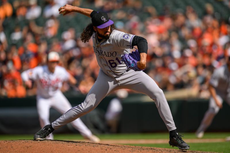 Aug 27, 2023; Baltimore, Maryland, USA; Colorado Rockies relief pitcher Justin Lawrence (61) throws a pitch during the eighth inning against the Baltimore Orioles at Oriole Park at Camden Yards. Mandatory Credit: Reggie Hildred-USA TODAY Sports