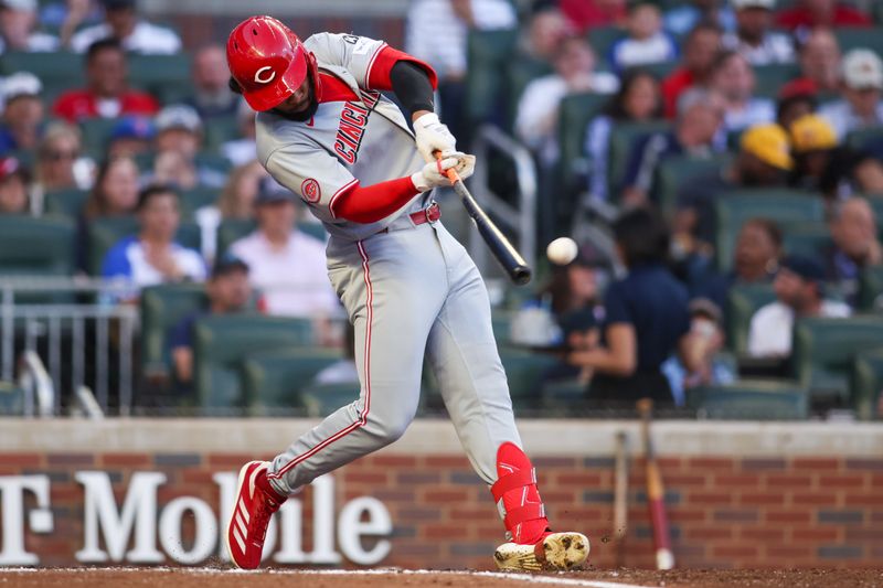 May 8, 2025; Atlanta, Georgia, USA; Cincinnati Reds right fielder Rece Hinds (57) hits a double against the Atlanta Braves in the third inning at Truist Park. Mandatory Credit: Brett Davis-Imagn Images