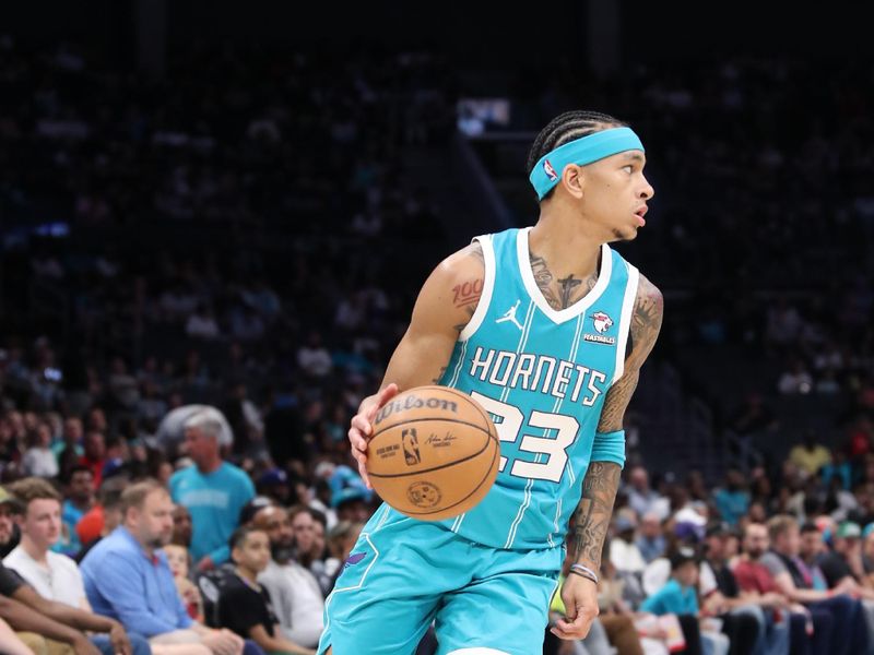 CHARLOTTE, NC - MARCH 31: Tre Mann #23 of the Charlotte Hornets dribbles the ball during the game against the LA Clippers on March 31, 2024 at Spectrum Center in Charlotte, North Carolina. NOTE TO USER: User expressly acknowledges and agrees that, by downloading and or using this photograph, User is consenting to the terms and conditions of the Getty Images License Agreement.  Mandatory Copyright Notice:  Copyright 2024 NBAE (Photo by Brock Williams-Smith/NBAE via Getty Images)