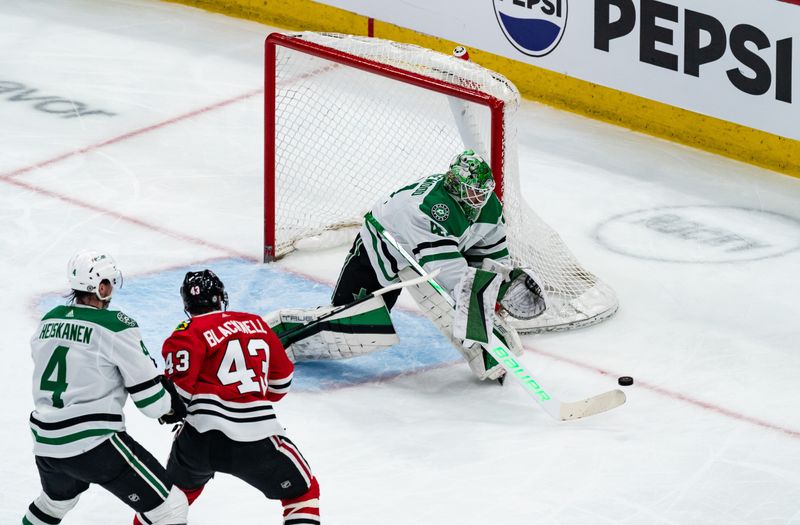 Apr 6, 2024; Chicago, Illinois, USA; Dallas Stars goaltender Scott Wedgewood (41) defends the net against the Chicago Blackhawks during the second period at United Center. Mandatory Credit: Seeger Gray-USA TODAY Sports