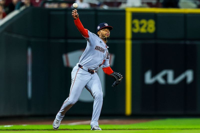 May 2, 2025; Cincinnati, Ohio, USA; Washington Nationals third baseman Jose Tena (8) throws to first to get Cincinnati Reds catcher Jose Trevino (not pictured) out in the third inning at Great American Ball Park. Mandatory Credit: Katie Stratman-Imagn Images