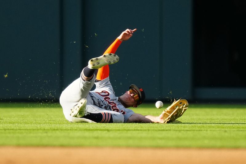 Jul 1, 2023; Denver, Colorado, USA; Detroit Tigers right fielder Kerry Carpenter (30) is unable to field the ball in the first inning against the Colorado Rockies at Coors Field. Mandatory Credit: Ron Chenoy-USA TODAY Sports